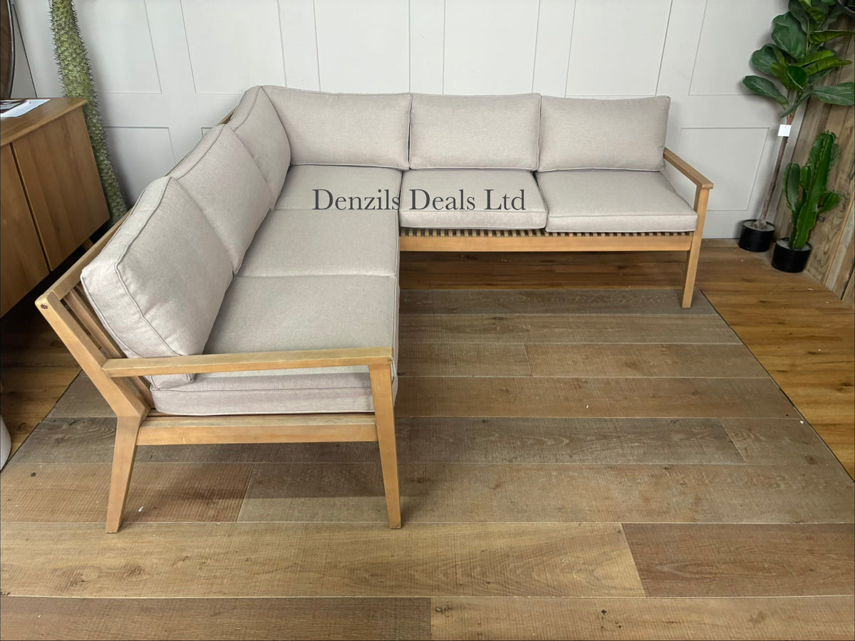 The John Lewis Mona 4-Seater Corner Garden Sofa features a contemporary slatted design made from sustainably sourced, weather-resistant FSC-certified acacia wood