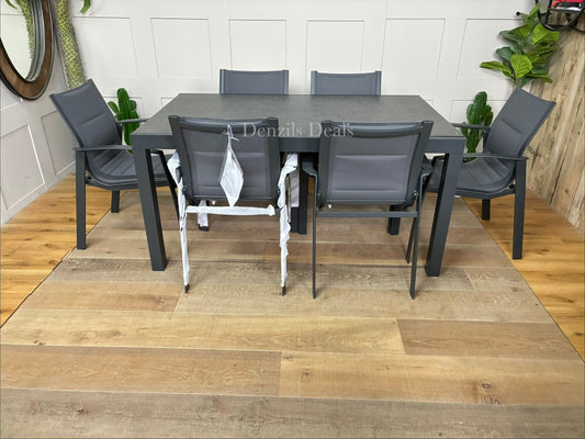 The John Lewis Tampa Rectangular Garden Dining Table features a robust aluminium frame and a ceramic-effect glass table top designed to seat up to six people