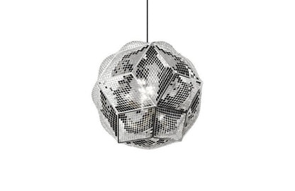 Tom Dixon Puff Pendant Light pendant in stainless steel. It features an intricate polyhedral shape made of diamond-shaped metal panels that are etched and perforated, giving it a ballooned, inflated appearance. The metallic surface creates a shimmering, 'inverted disco ball' effect when lit. 