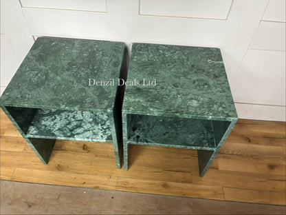 Two matching Anthropologie Gia Open Side Tables side-by-side. The tables are constructed entirely of solid, polished green marble featuring organic dark and light veining, with a minimalist, open-frame design that creates a hollow lower clearance.