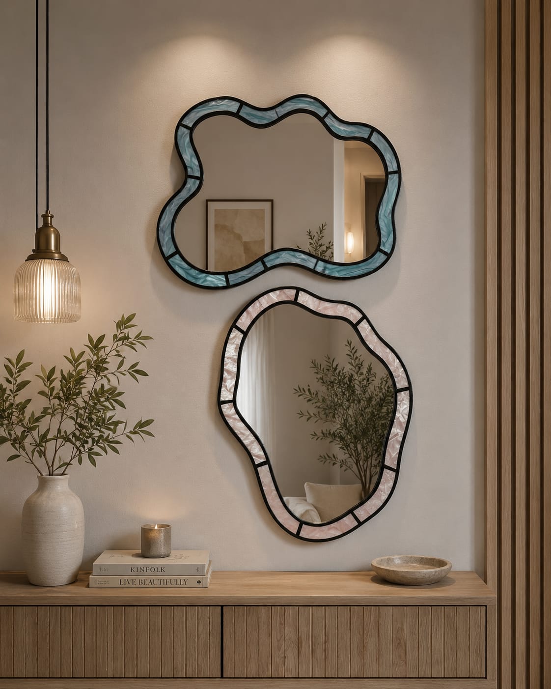 Two vertically oriented, rectangular wall mirrors featuring wavy, "squiggle" frame. The mirror on the left has a light, pearlescent lilac purple frame, while the mirror on the right has a matching pearlescent soft blue frame, both displaying a subtle, glossy iridescence.