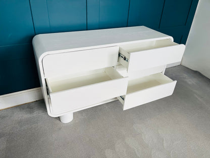 Urban Outfitters Huron White Chest of drawers. White 6-drawer wooden chest with grooved pulls and a lacquered finish."