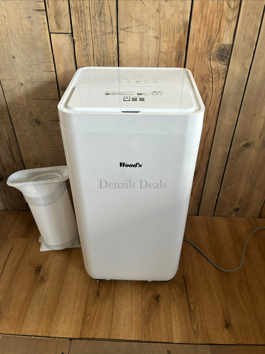 White Wood's Milan 9K WiFi portable air conditioner, 9000 BTU, with a sleek, vertical design, front digital display, and remote control, shown in a modern living space
