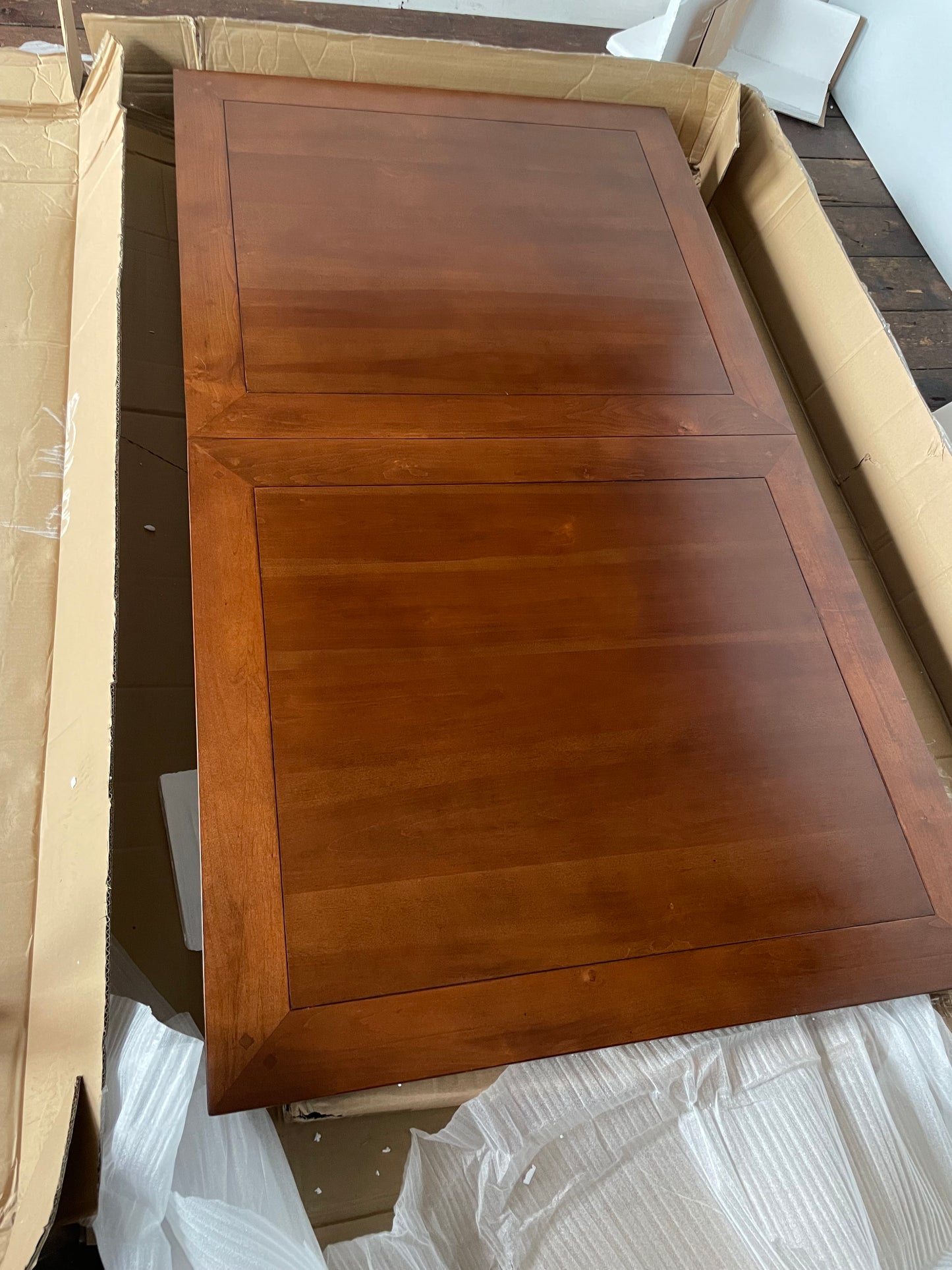 6-8 seater Willis Gambier New York extending dining table fully extended, showcasing its modern lines and ample seating space.