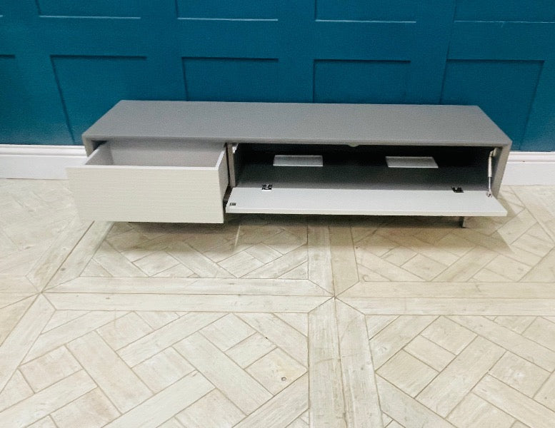Wave embossed effect on the taupe drawer fronts of the Dante TV unit by John Lewis & Partners