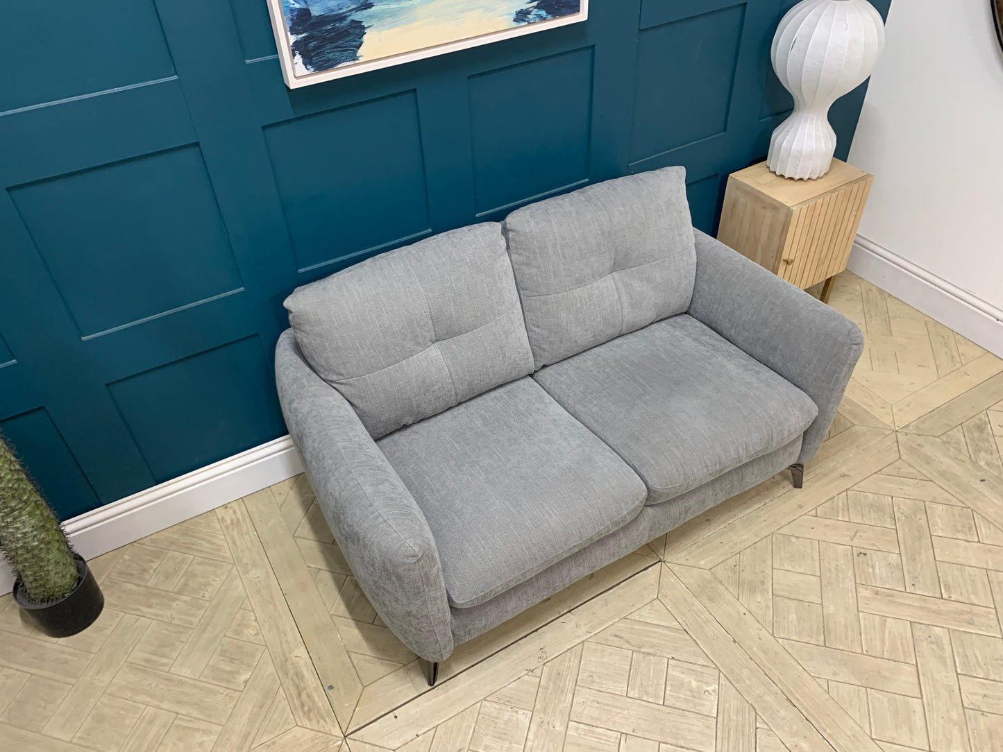 Detail of grey mix cross weave fabric upholstery on the Sofology Mimi 2 seater sofa.