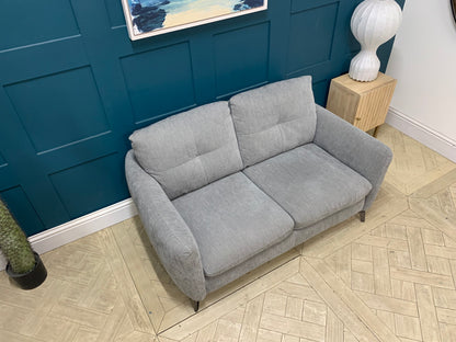 Detail of grey mix cross weave fabric upholstery on the Sofology Mimi 2 seater sofa.