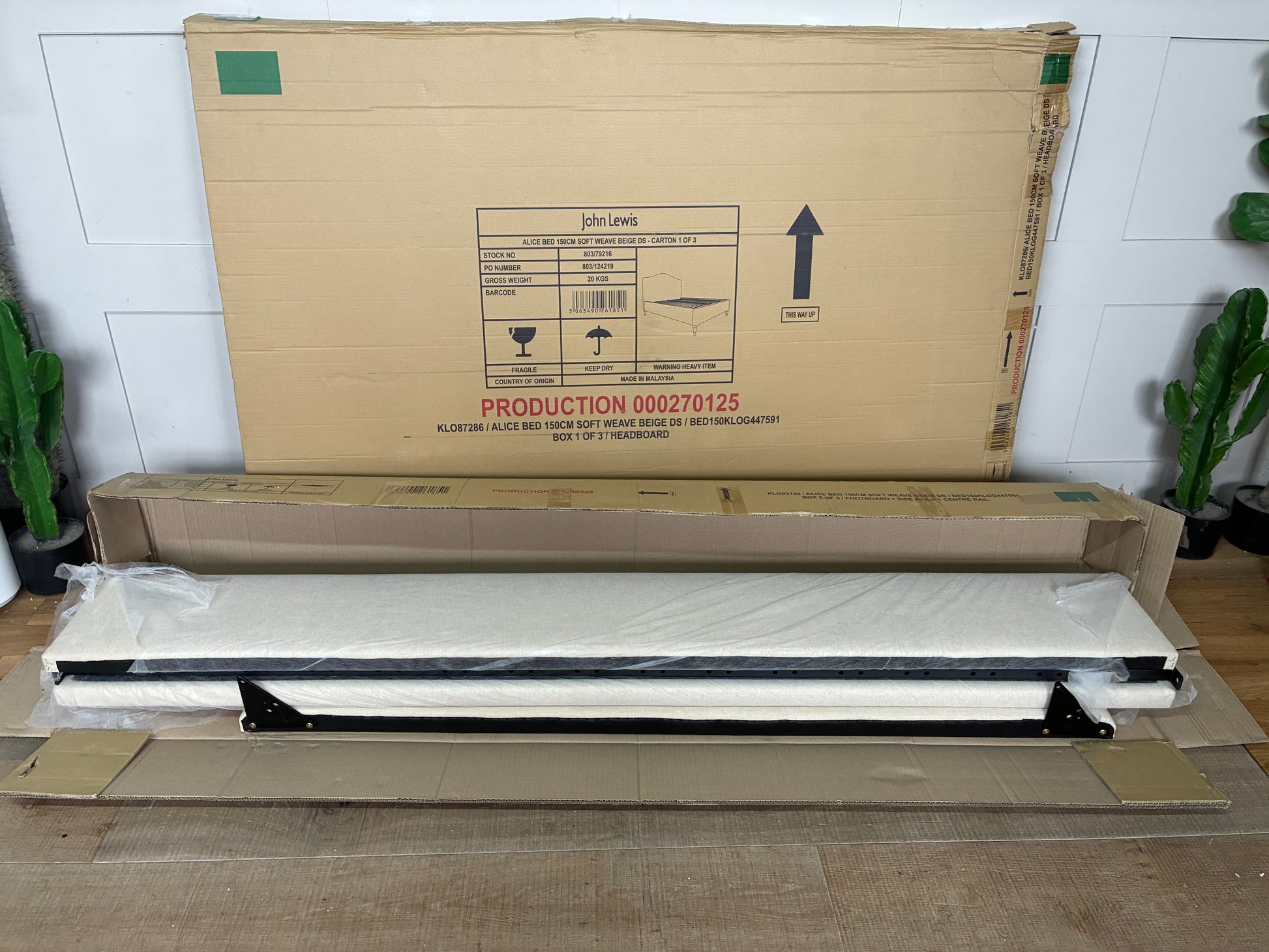  king-size John Lewis Alice Bed Frame, showcasing a beige fabric headboard with a gentle curve, vertical seaming, and light-colored wooden legs